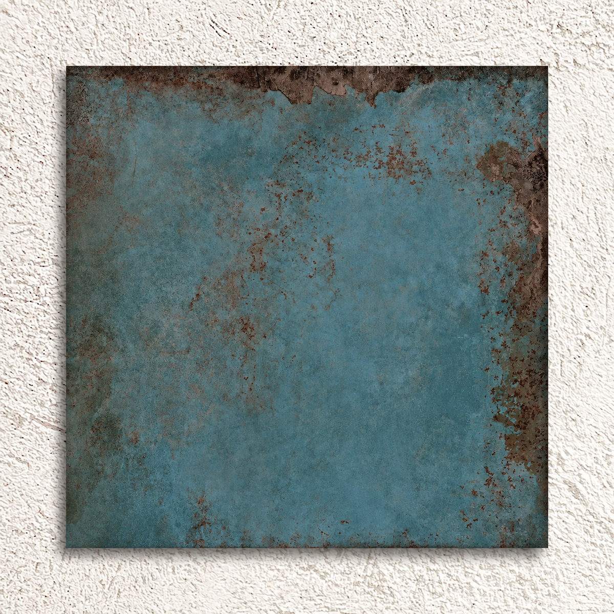 Single Alloy Azzurro 600 × 600mm matt porcelain tile showing smoky blue tones and rust-brown metal effect detailing.