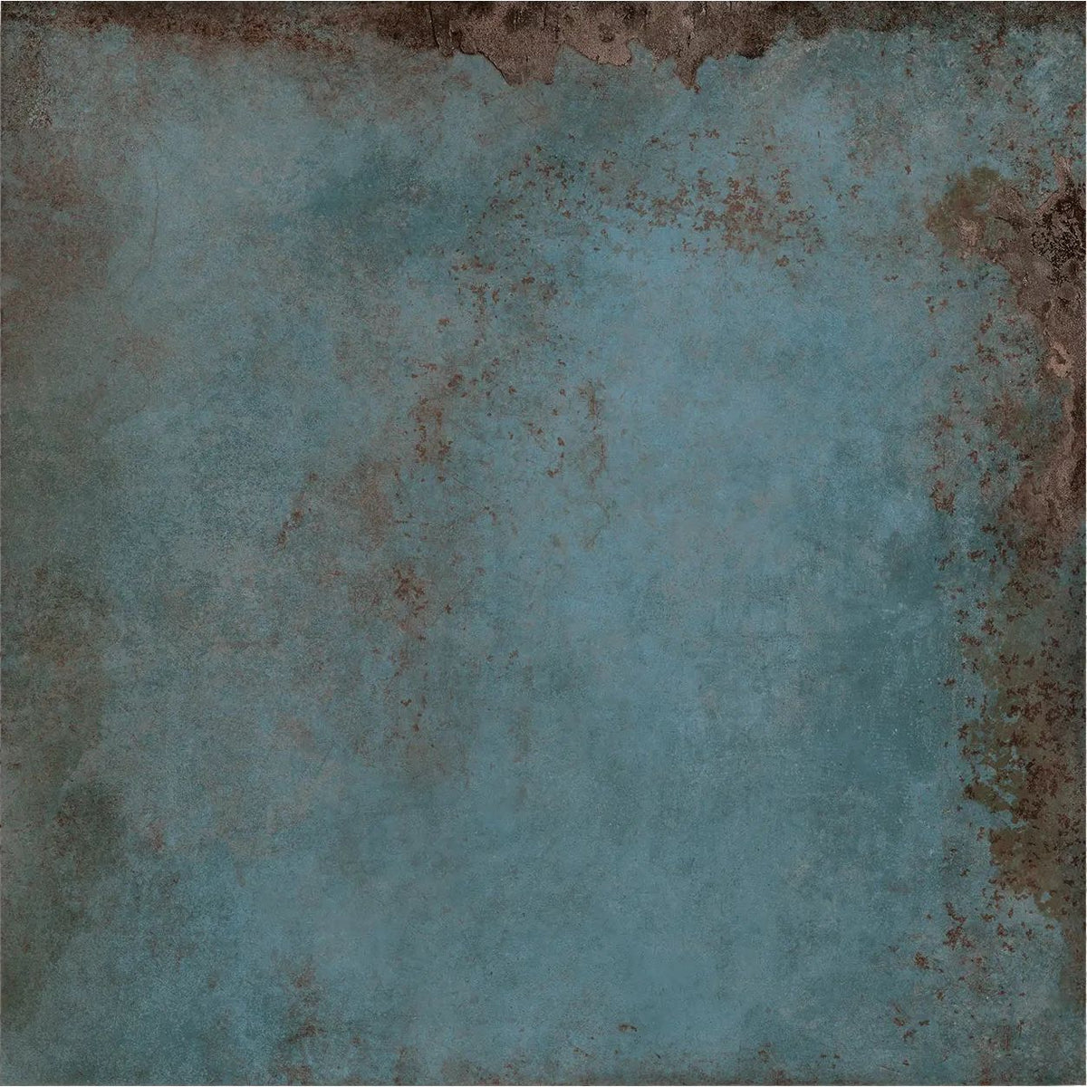 Close-up of Alloy Azzurro blue metal effect matt porcelain tile, showing smoky blue tones and rust-brown oxidised detailing