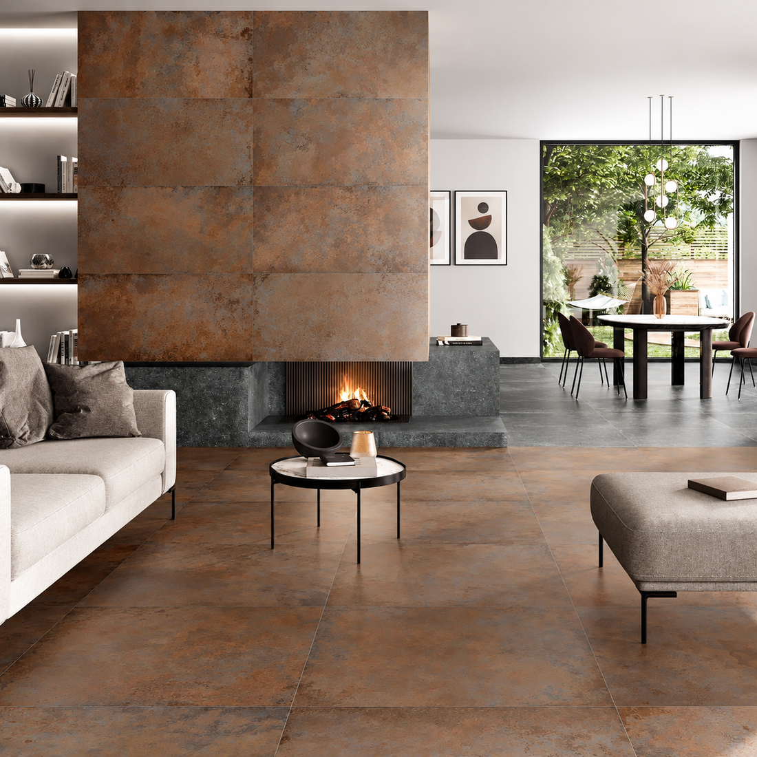 Alloy Copper porcelain tiles across a living room floor and chimney breast, paired with cream seating and a recessed fireplace.