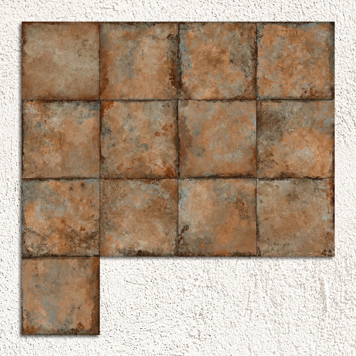 Tile display showing the varied copper-brown shades, dark edging and blue-grey patina of the Alloy Copper range.