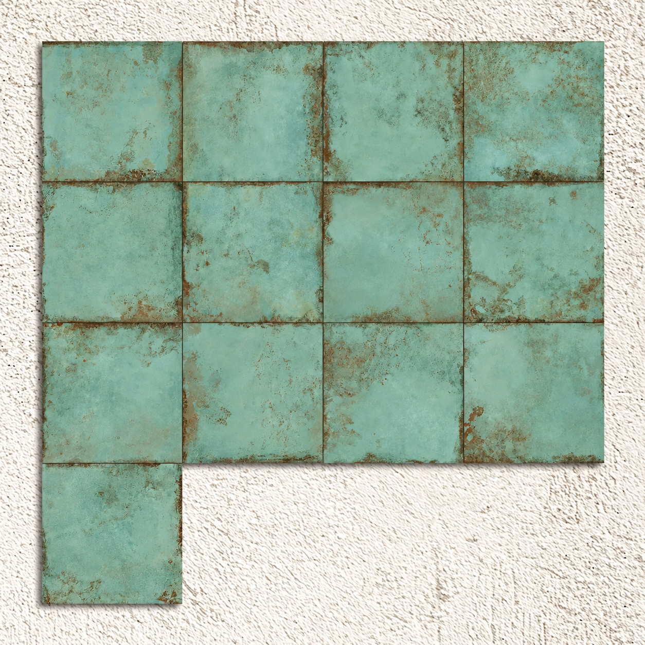 Alloy Mint square tiles arranged against a white background, showing varied green tones and oxidised metal-effect markings.
