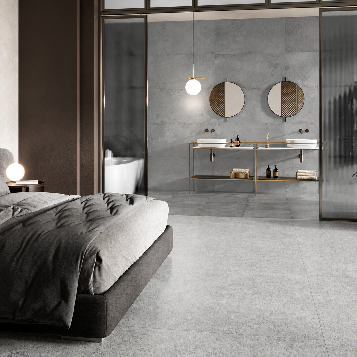 Alloy Pearl grey porcelain flooring in a bedroom leading into an en-suite with matching tiled walls and twin basins.