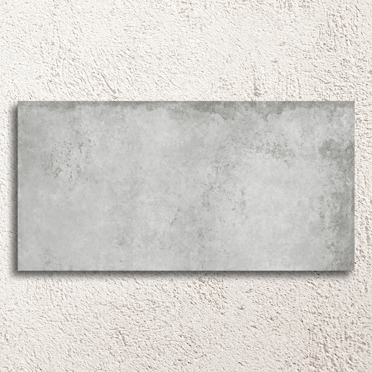 Single Alloy Pearl 600 × 1200mm semi-polished porcelain tile with pale grey weathered metal effect detailing.
