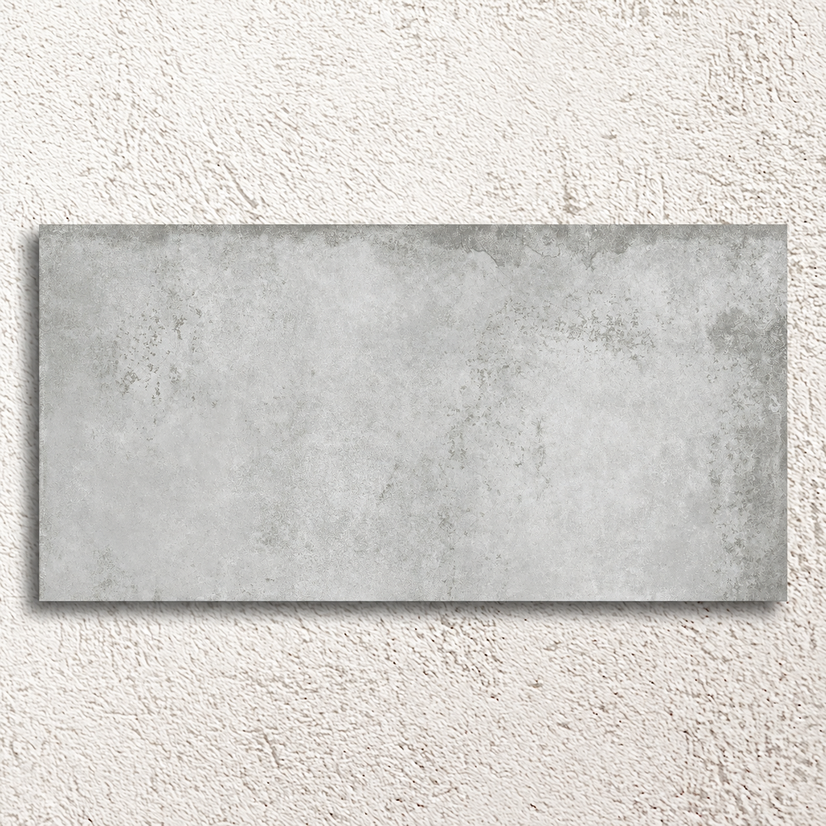 Single Alloy Pearl 600 × 1200mm semi-polished porcelain tile with pale grey weathered metal effect detailing.