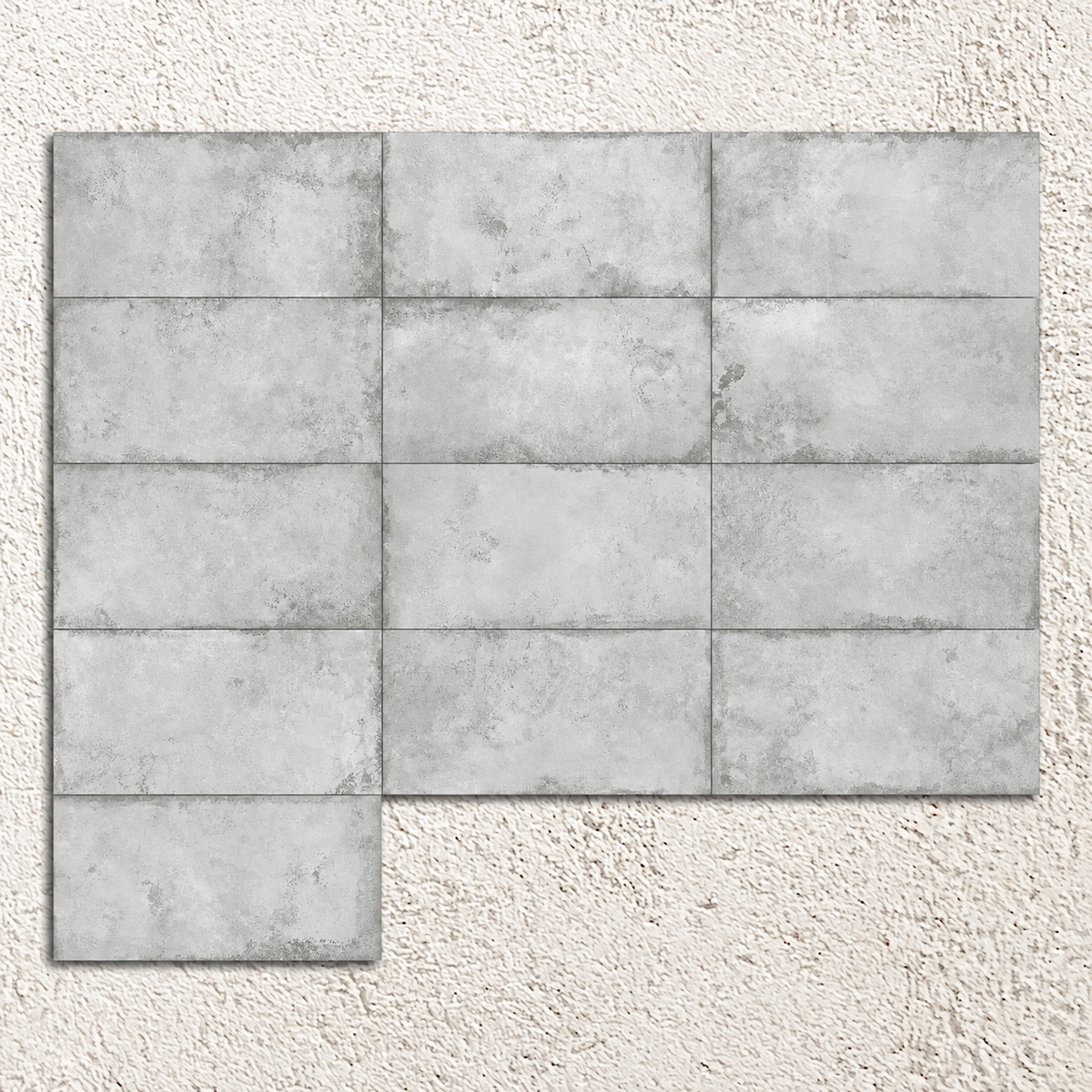 Alloy Pearl rectangular porcelain tiles arranged to show substantial variation in pearl-grey shading and metal effect patterns.