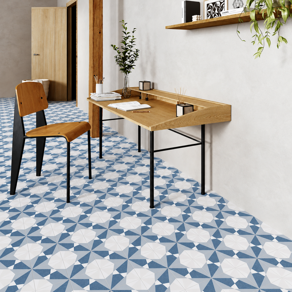 Altea Blue Taco geometric porcelain floor tiles in a home office with an oak desk and wooden chair.