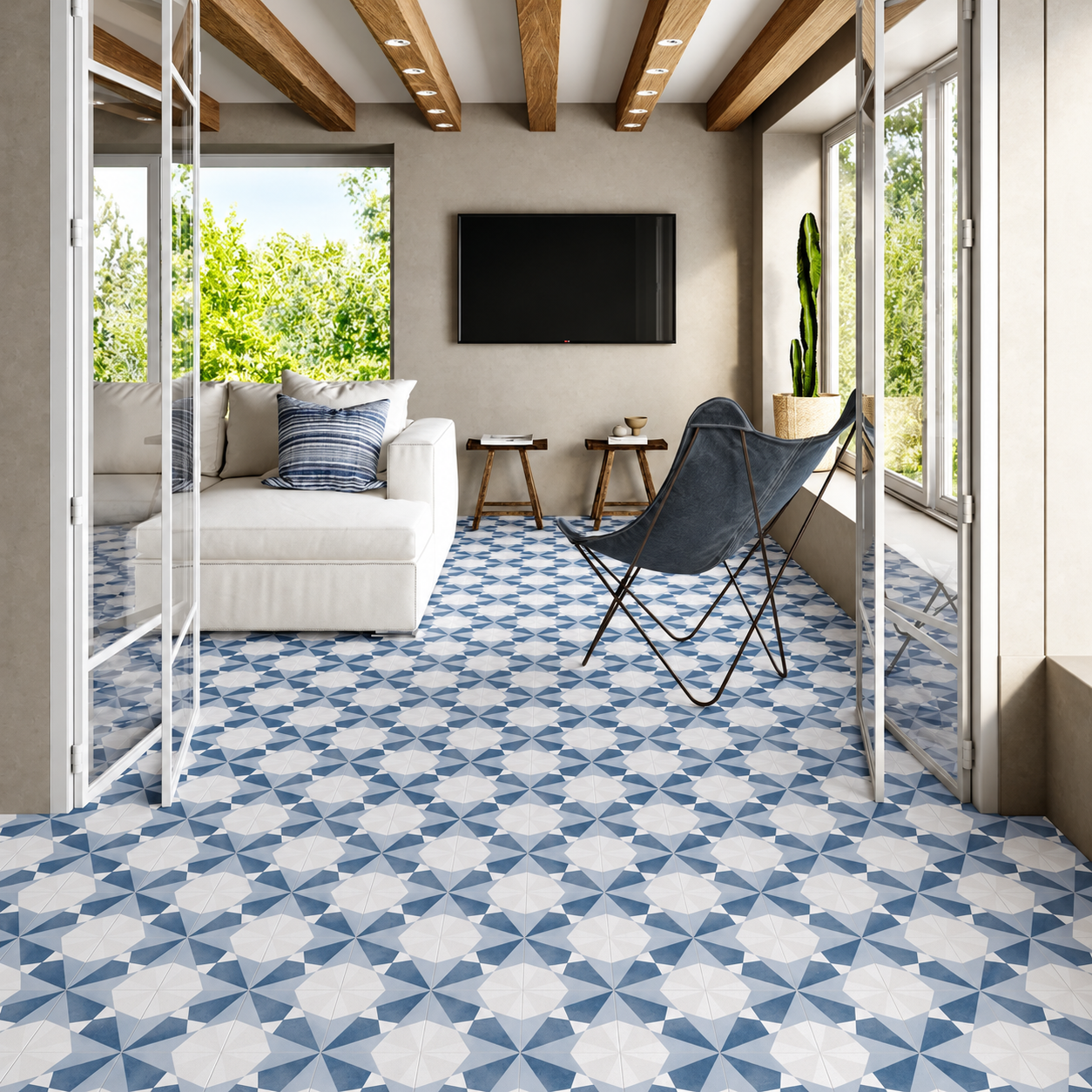 Altea Blue Taco blue and white patterned floor tiles in a living room with exposed timber beams.