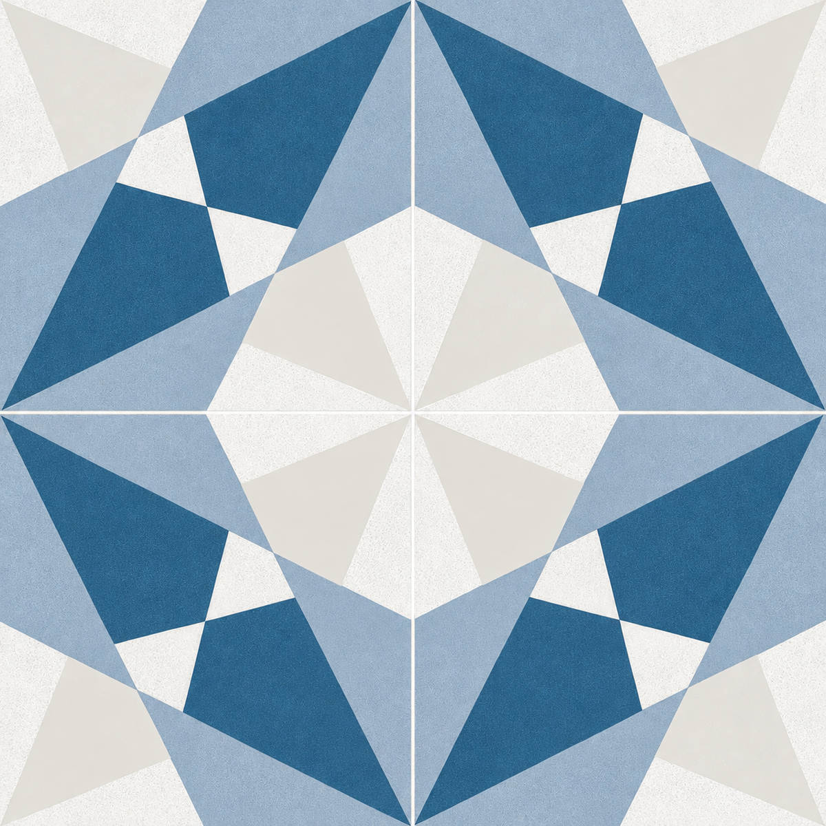 Close-up of four Altea Blue Taco tiles forming a blue and white geometric pattern with pale grout.