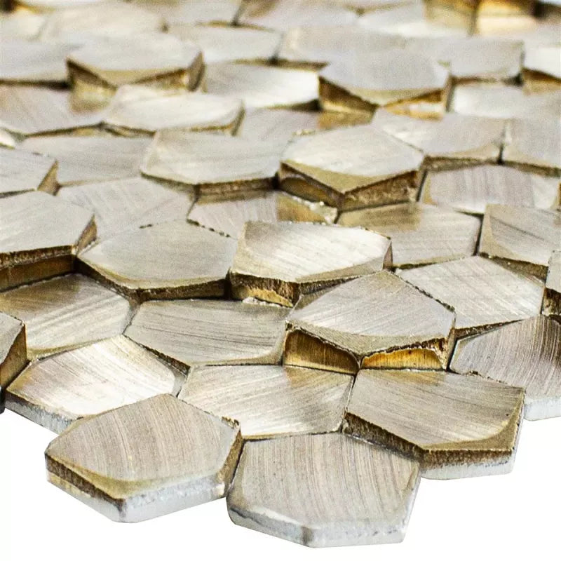 Close-up of bronze aluminium hexagonal mosaic tiles with brushed matt 3D surface detail