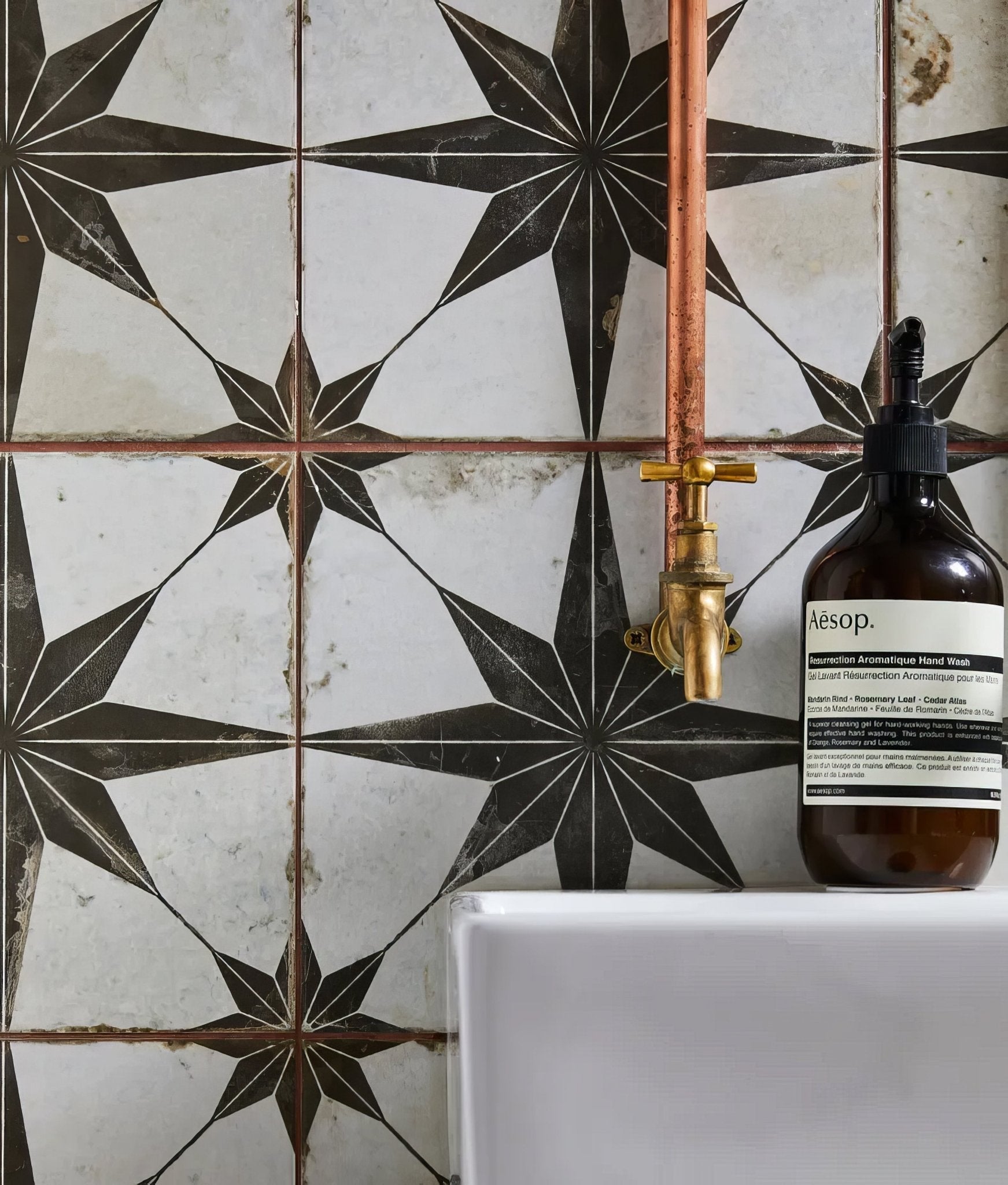 black and beige pattern tile