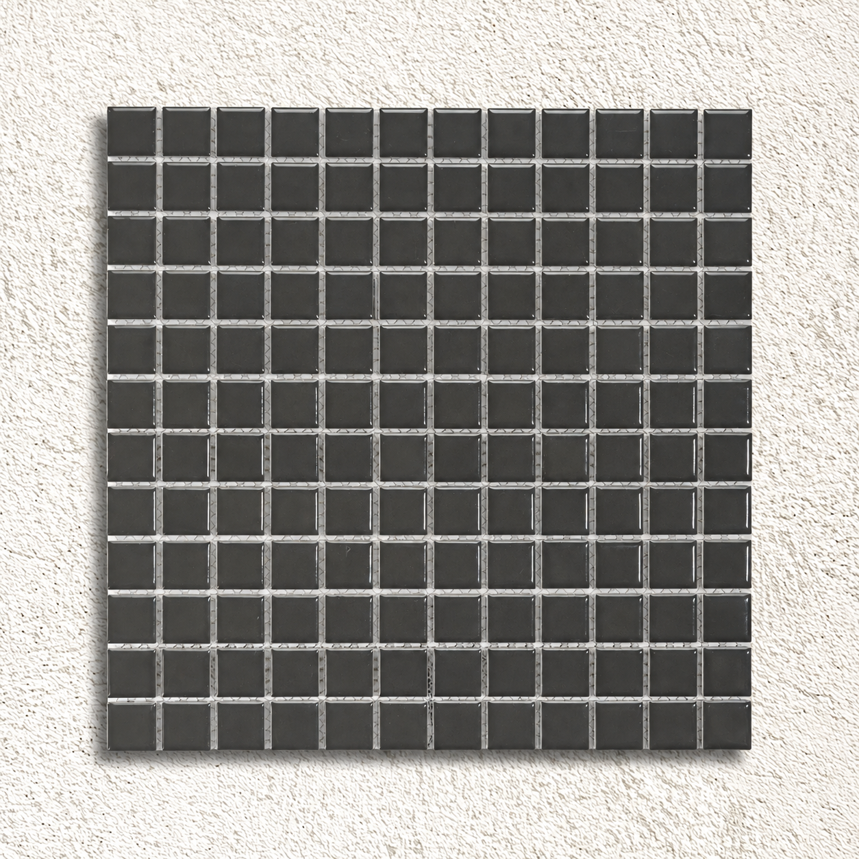 Ceramic Pool Gunmetal Grey Mosaic Tile sheet featuring glossy 23 × 23mm dark grey porcelain squares with visible mesh backing.