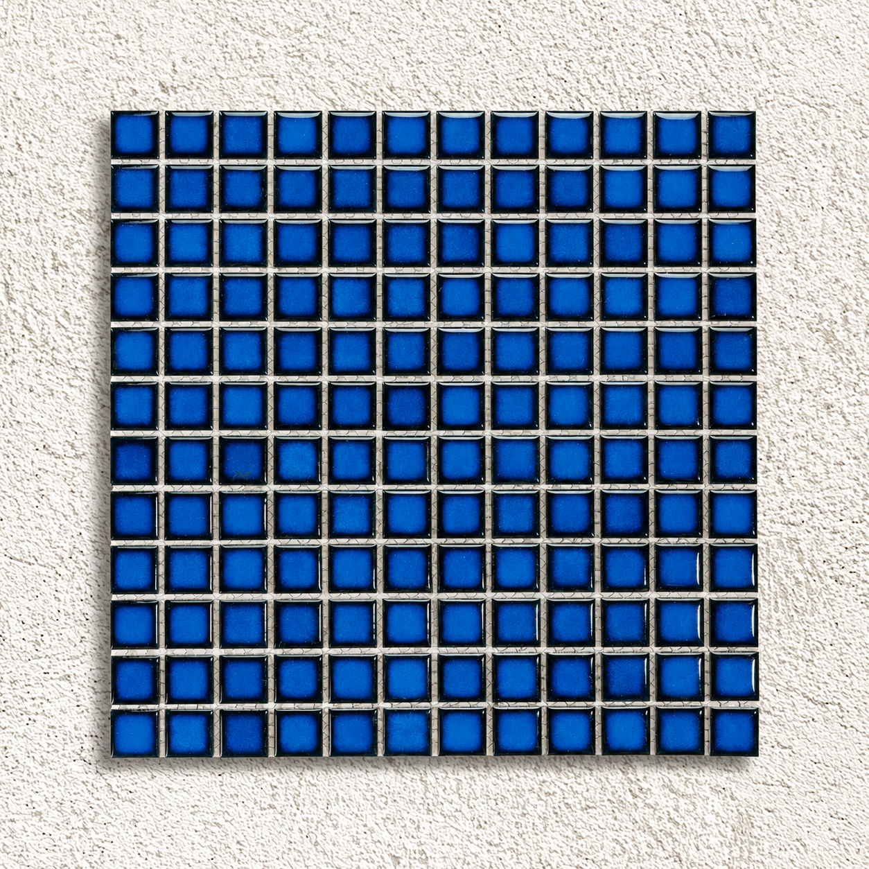 Ceramic Pool Sapphire Mosaic Tile sheet showing glossy 23 × 23mm porcelain squares with blue centres and dark navy edges.
