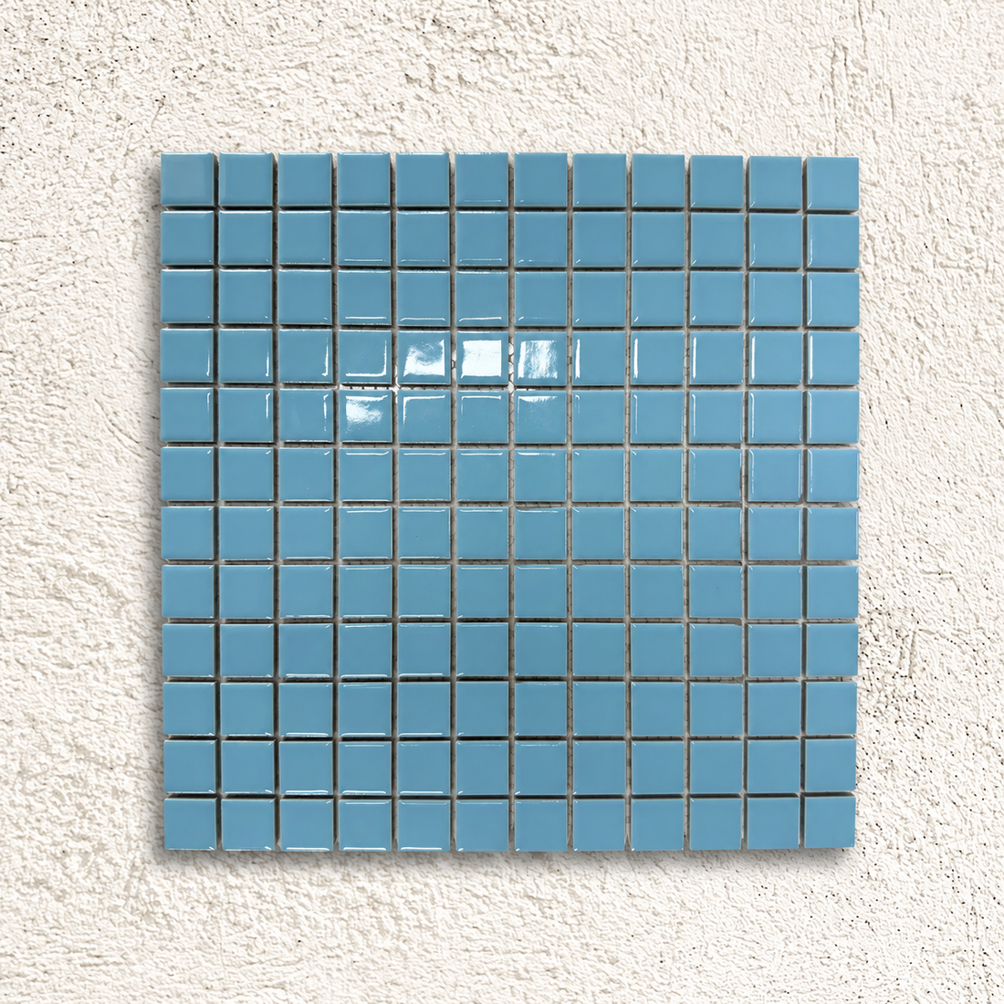 Ceramic Pool Sky Blue Mosaic Tiles showing glossy 23 × 23mm porcelain squares on a mesh-backed sheet.