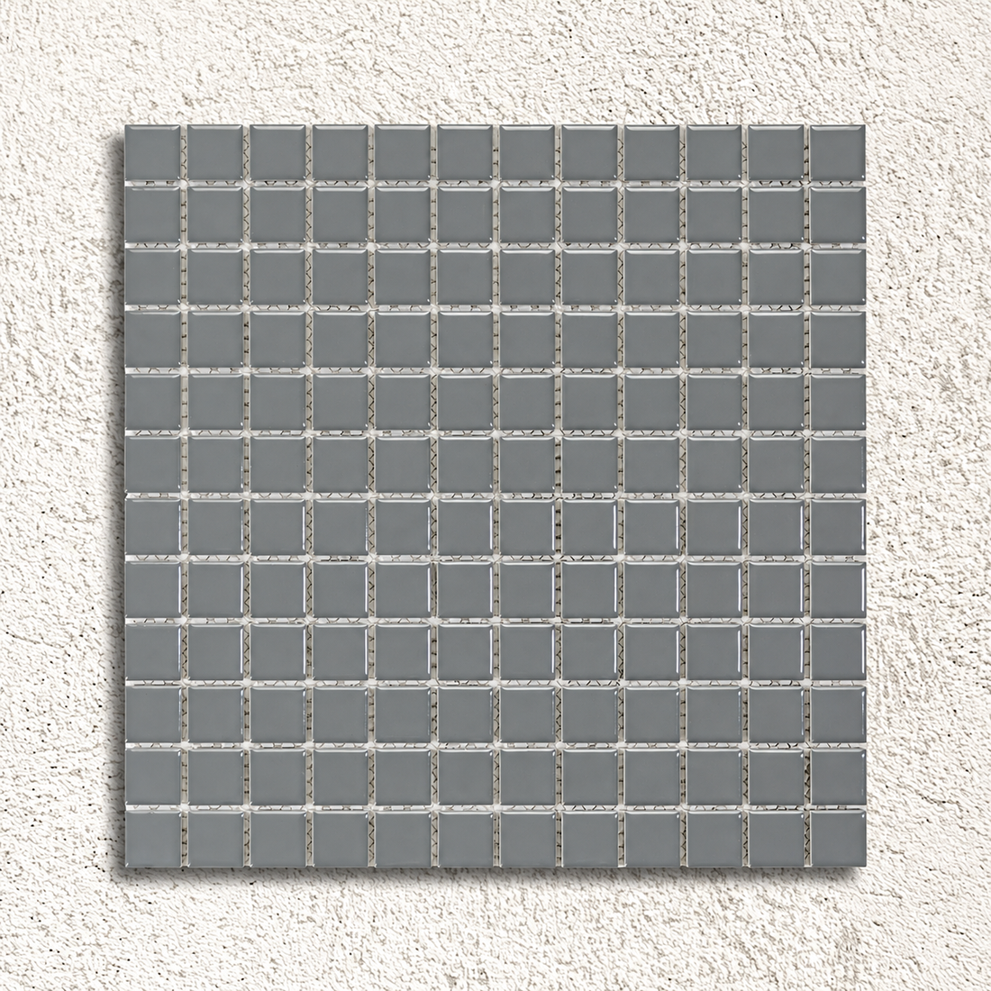 Ceramic Pool Steel Grey Mosaic Tile sheet showing glossy grey 23mm porcelain squares with visible mesh backing against a textured white background.
