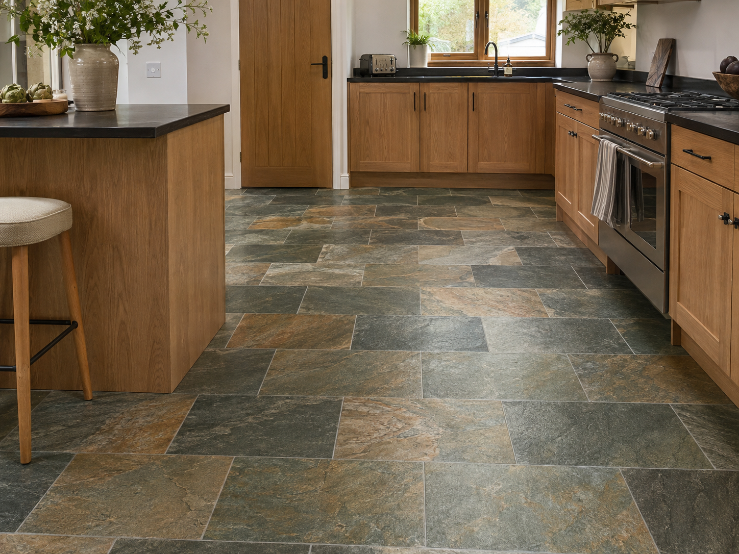 Country Farmhouse Multicolour Slate Effect Porcelain Tile 60x30cm laid in a staggered kitchen floor with natural grey, charcoal and rust-toned slate variation