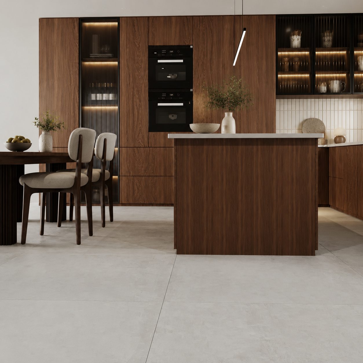 Overhead view of Driftwood Grey 1000x1000mm porcelain floor tiles surrounding a walnut kitchen island with luxury minimalist décor.
