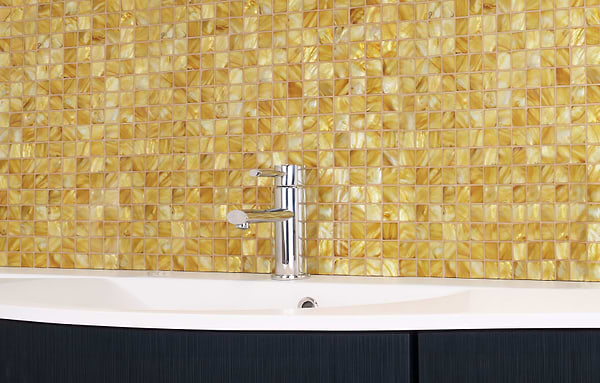 Mosaic emerald gold square laid in a bathroom