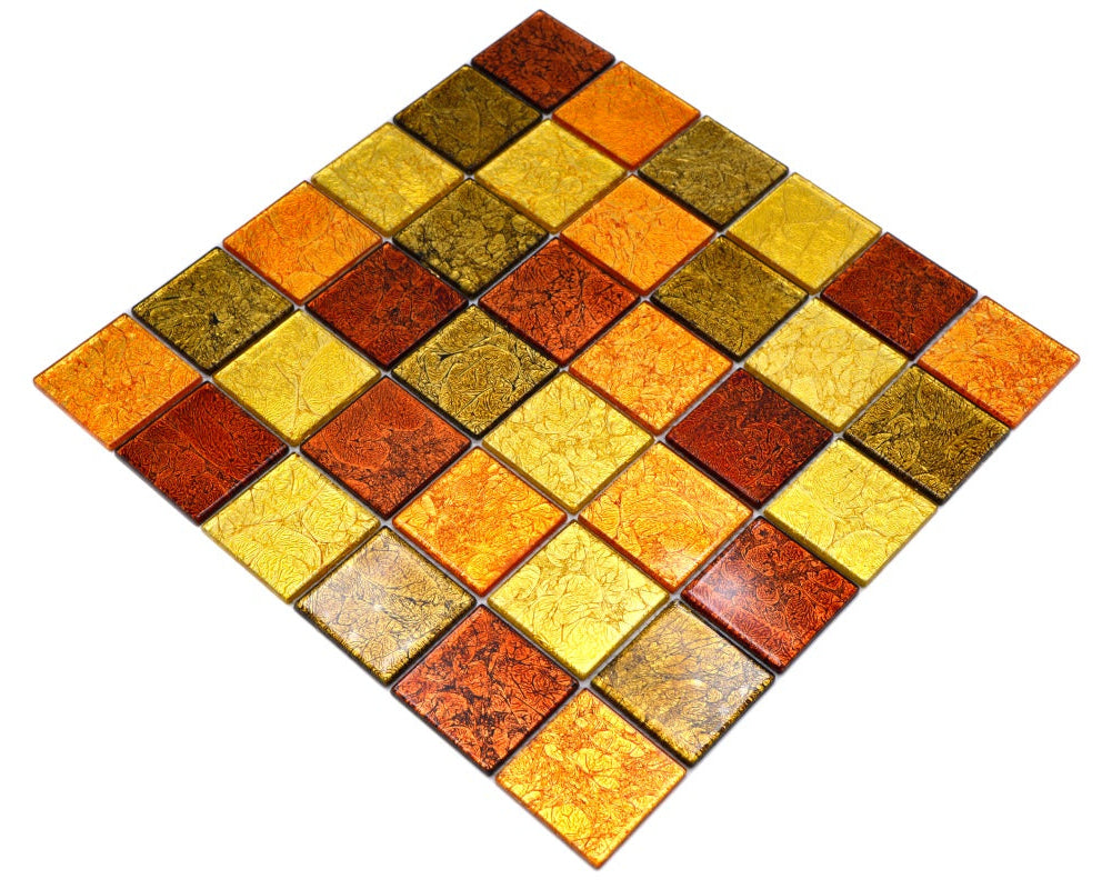 Gold brown bronze glass mosaic tile sheet shown diagonally on white background