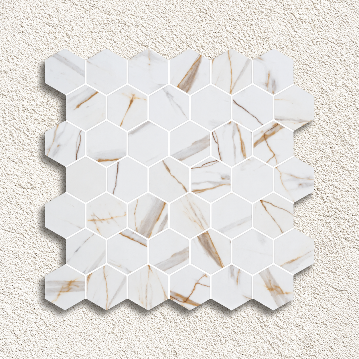 Hex XL Calacatta Gold glass mosaic sheet with 51mm white marble-effect hexagons and a matt finish.
