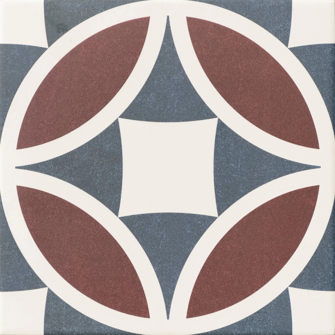 Close-up of Javanese Terracotta Petal Pattern Porcelain Tile showing terracotta petals, blue-grey detail and matt porcelain finish