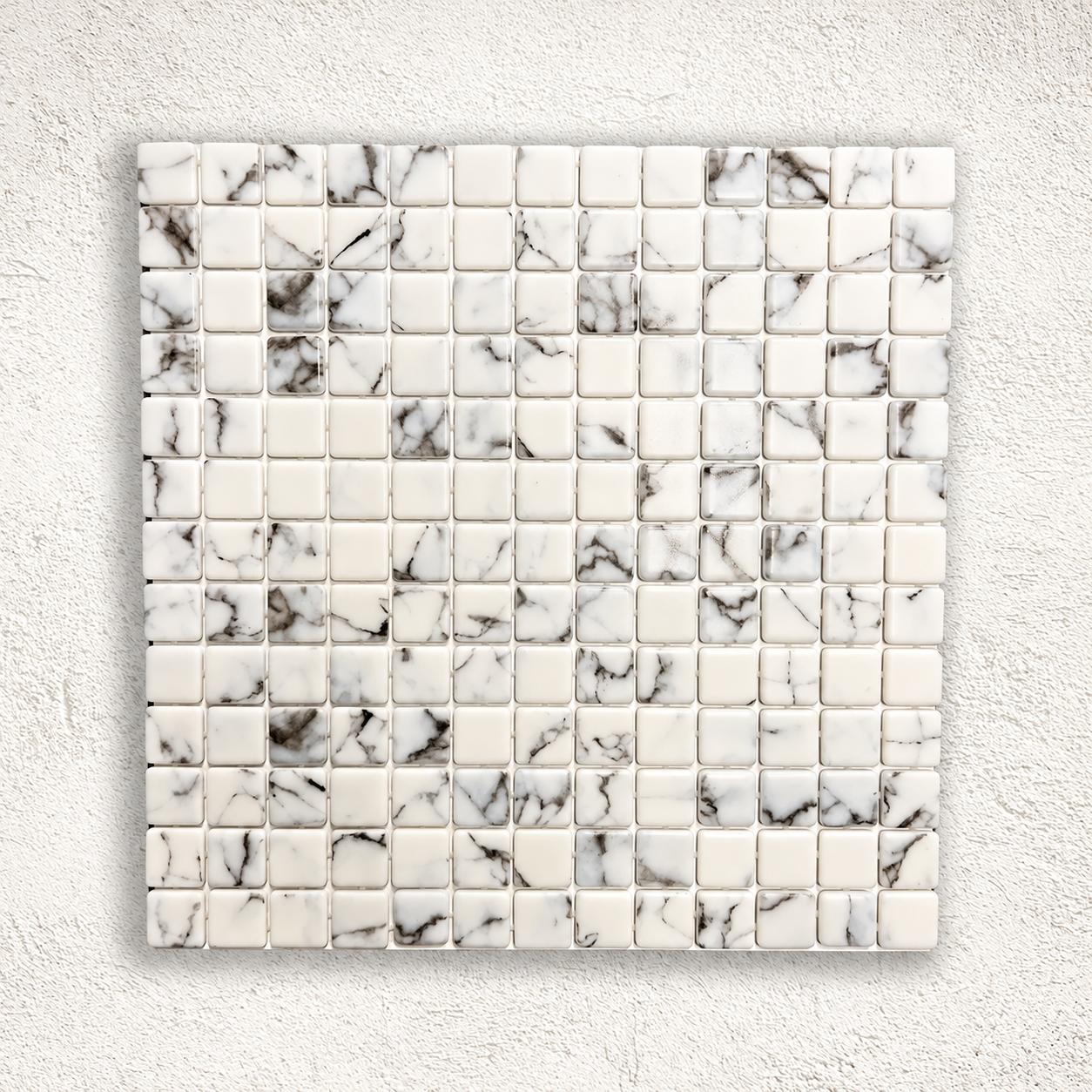 Karma Calacatta gloss glass mosaic sheet with 25mm white square pieces and grey marble effect veining.
