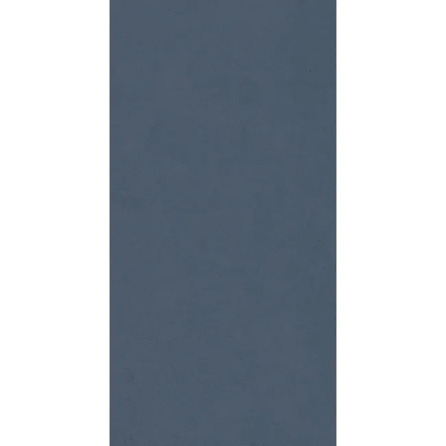 Liscio Avio 600×300mm ceramic wall tile in smoky slate blue with subtle grey undertones.