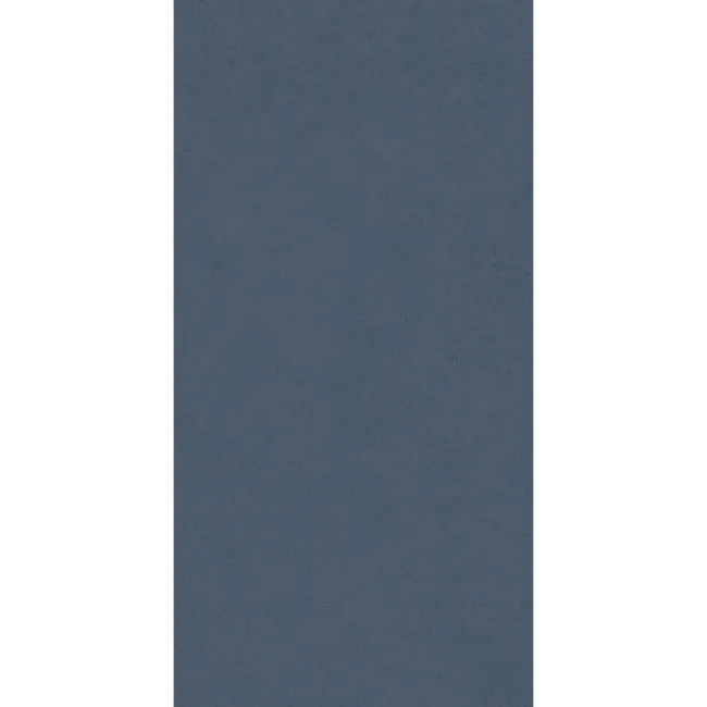 Front view of Liscio Avio slate blue wall tile showing its smooth matt finish and fine mottled detailing