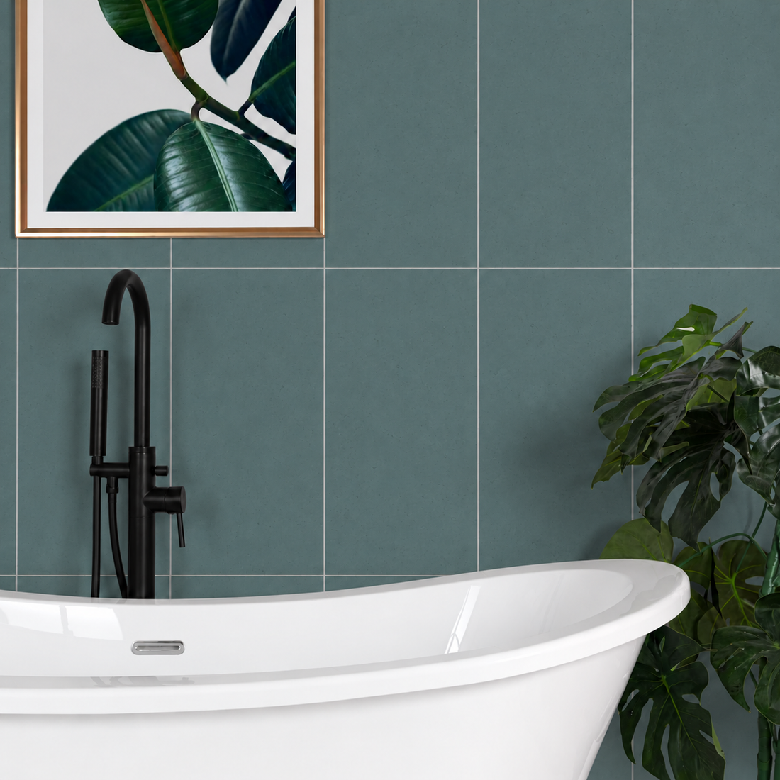 Liscio Ottanio teal matt wall tiles 600×300mm laid vertically behind a white freestanding bath with black tap and botanical décor.