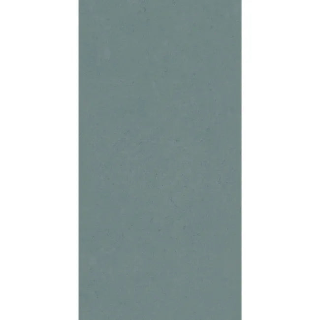 Liscio Ottanio 600×300mm ceramic wall tile in muted teal with fine mottled detailing.