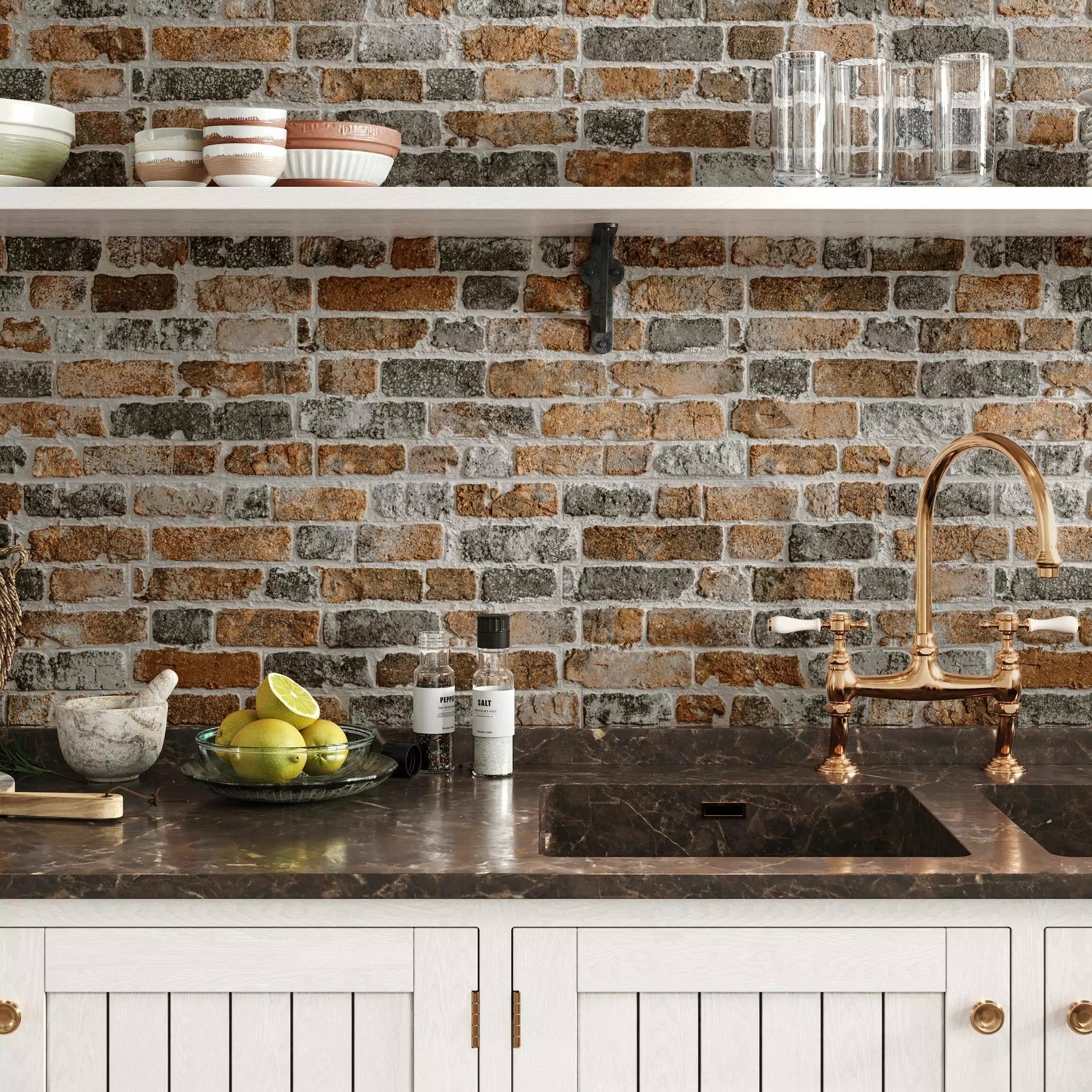 Modern kitchen with stone backsplash tile, sink, and countertop.
