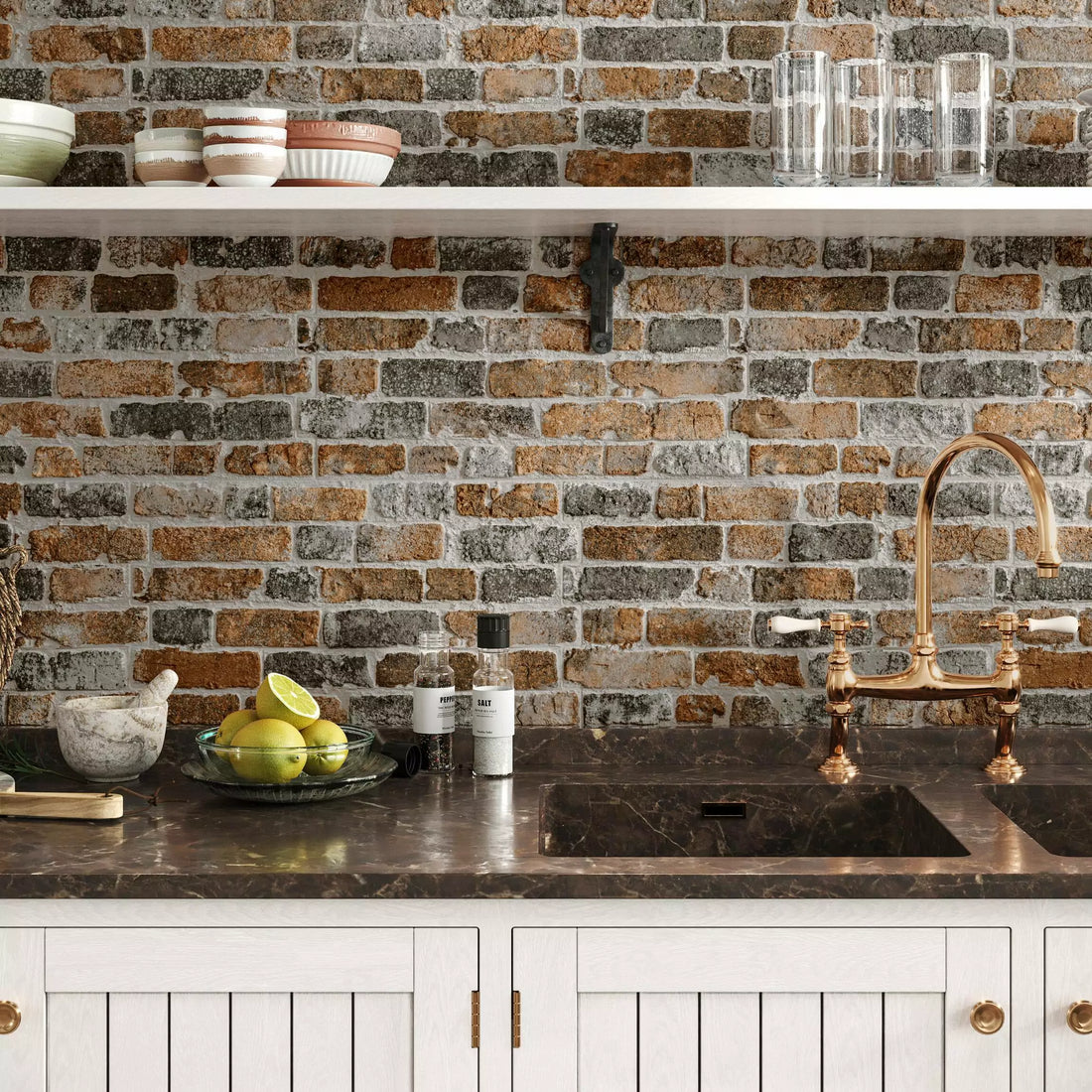 Modern kitchen with stone backsplash tile, sink, and countertop.