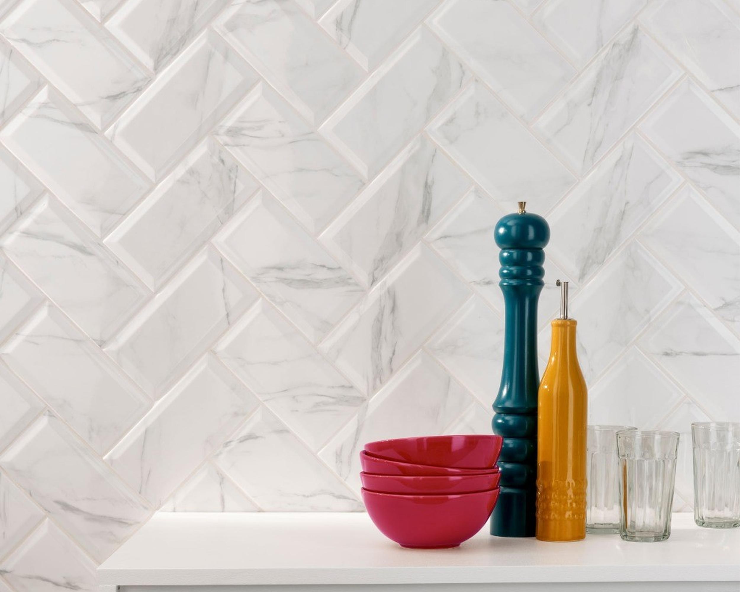white gloss polished tiles herringbone formation 