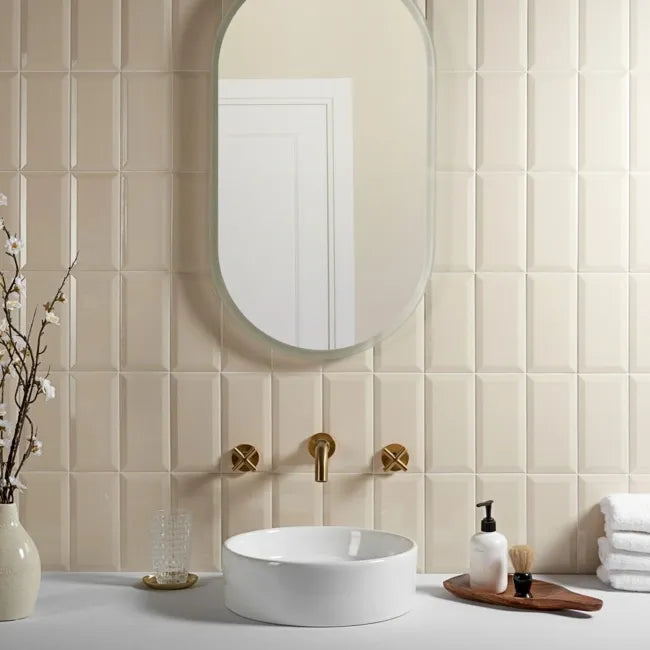 cream bevelled bathroom wall tiles in stick format 