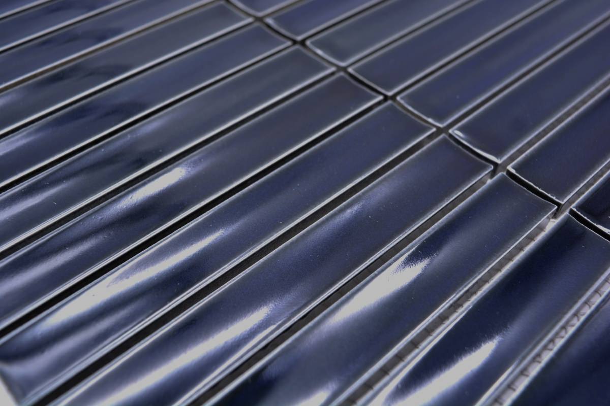Detailed view of glossy navy KitKat ceramic mosaic with slim 2 mm joints and reflective glazed surface