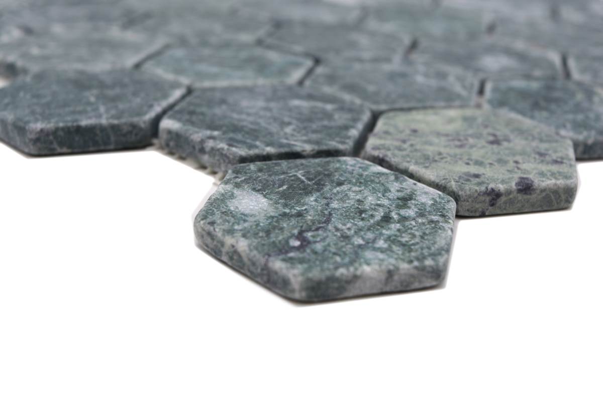 Close-up of Natural Verde Marble Hexagon Mosaic Tile showing green Italian marble, white veining and tumbled stone edges