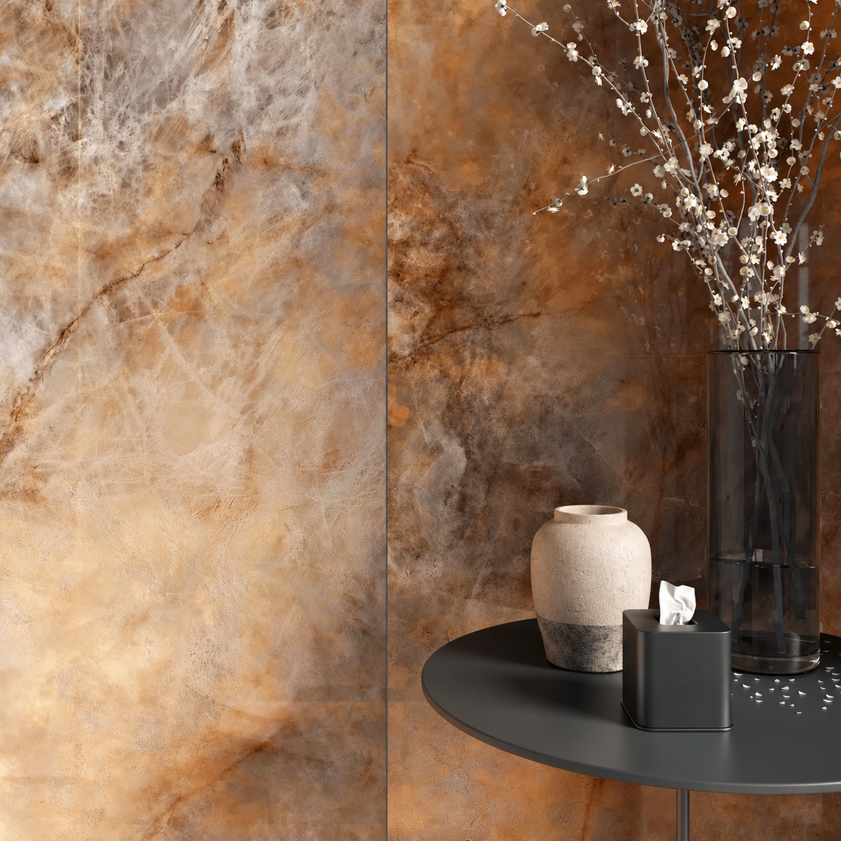 Polished grey and peach porcelain feature wall beside a black table with ceramic vases and flowering branches.