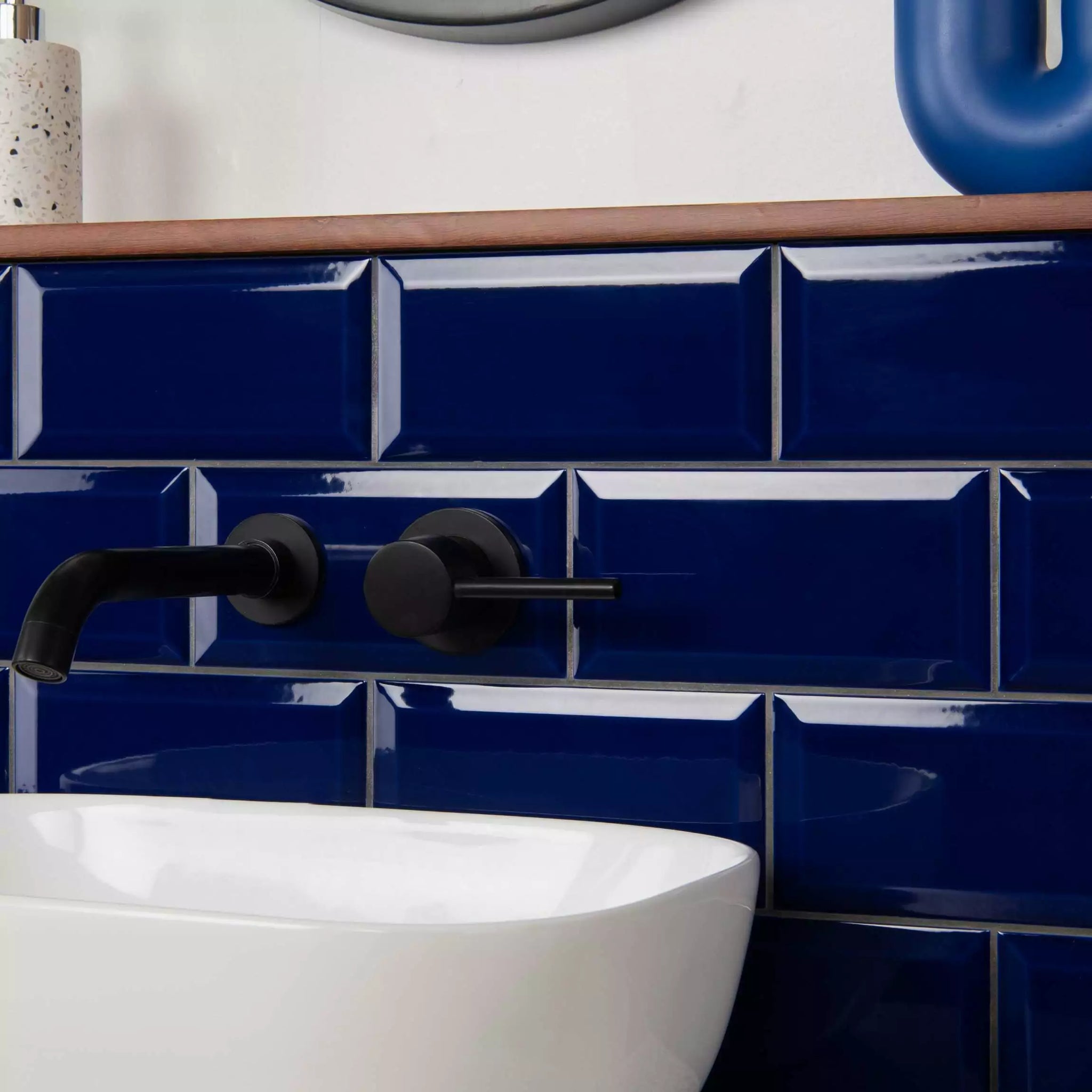 Bathroom with blue metro tiles