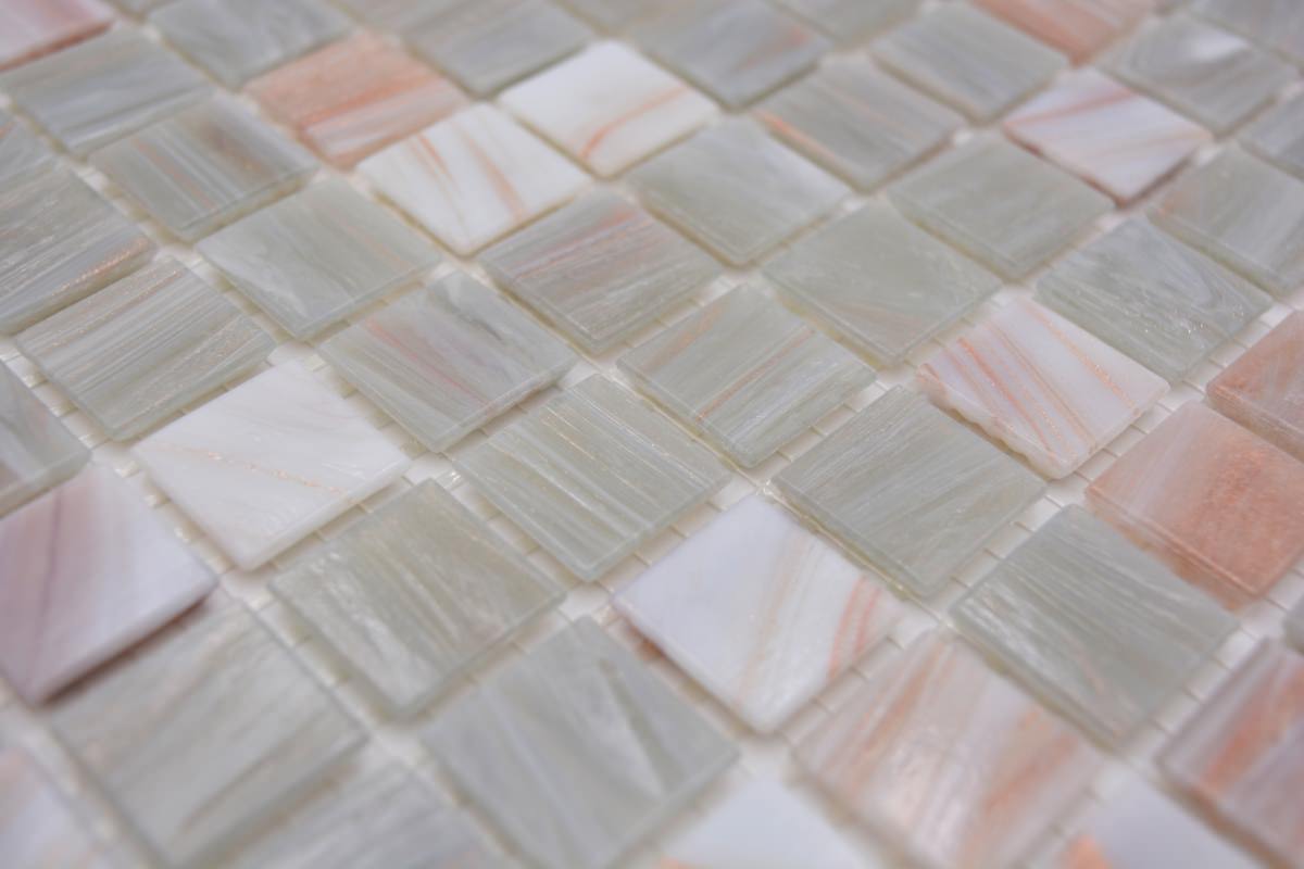 Low angle detail of Rose Silver swimming pool mosaic showing raised glossy glass chips in soft grey, white and rose-gold tones