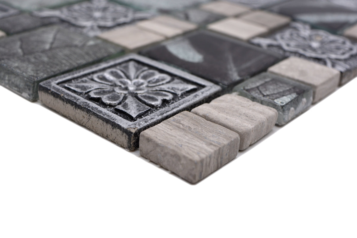 Close-up of Silver Grey Maple Mix Mosaic Tile showing raised floral ornament detail and textured grey glass pieces