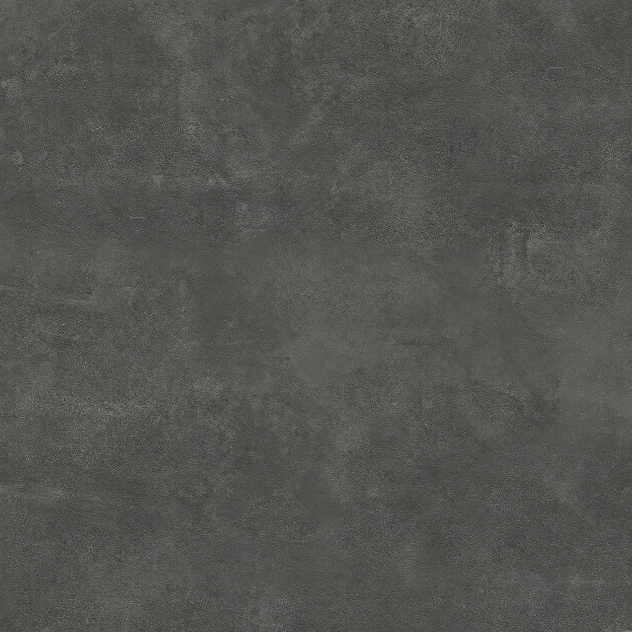 Close-up of the graphite grey tile surface showing subtle clouded markings and a matt finish.