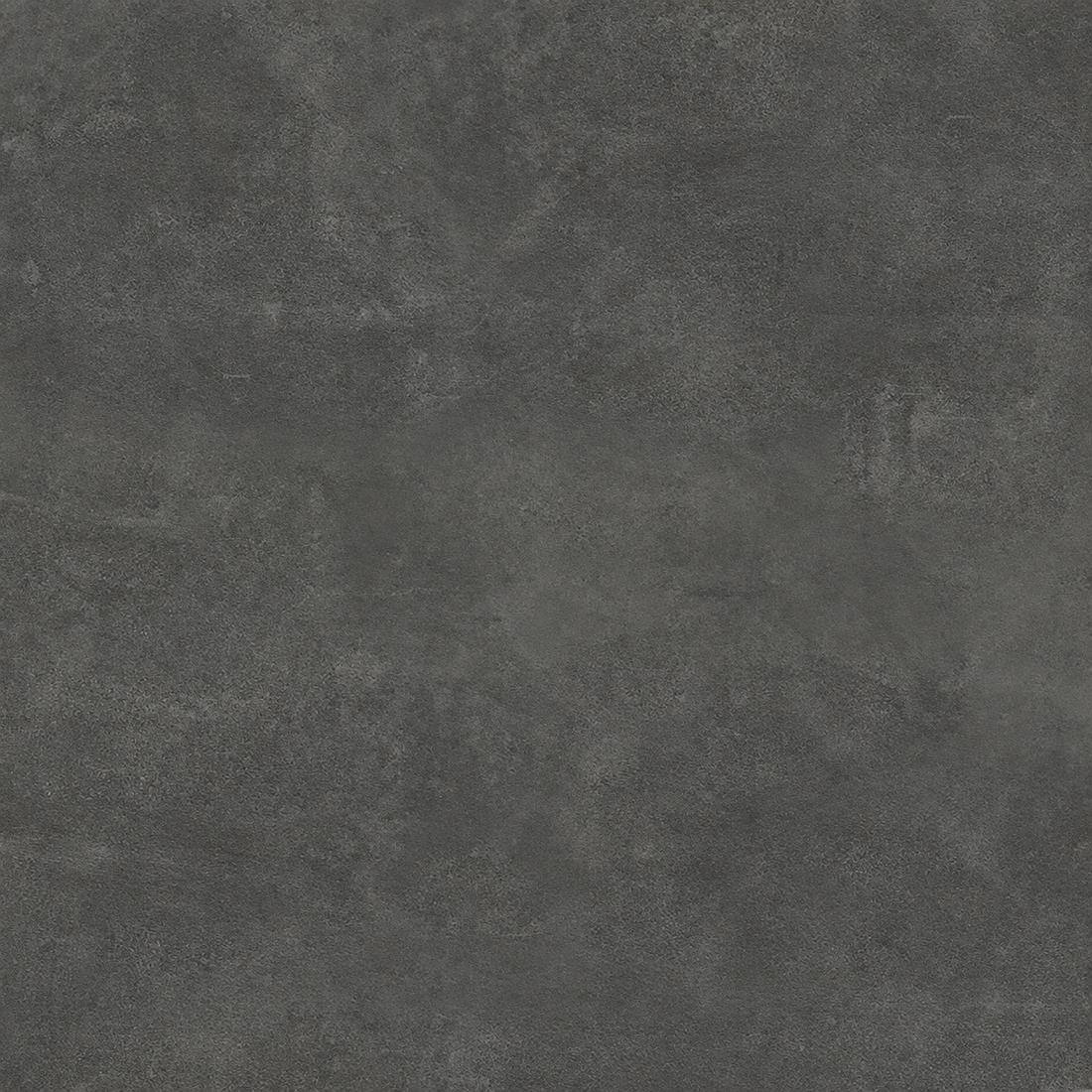 Close-up of the graphite grey tile surface showing subtle clouded markings and a matt finish.