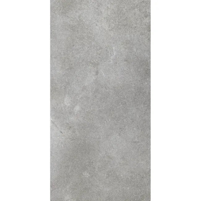 Single Stone Effect Grey LVT 600x300mm tile showing matt concrete-effect texture and soft grey tonal variation.