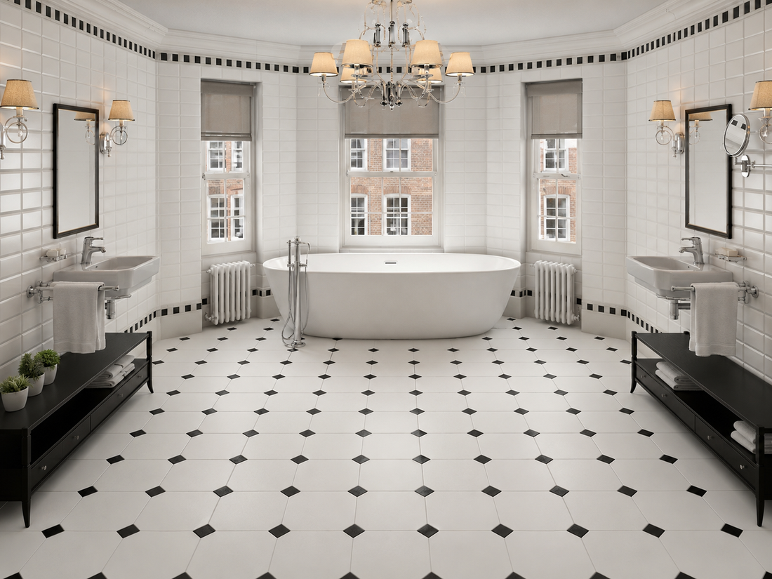 Victorian Octagon White &amp; Black Cabochon Porcelain Floor Tile installed in a bright period-style bathroom with freestanding bath and classic white wall tiles.