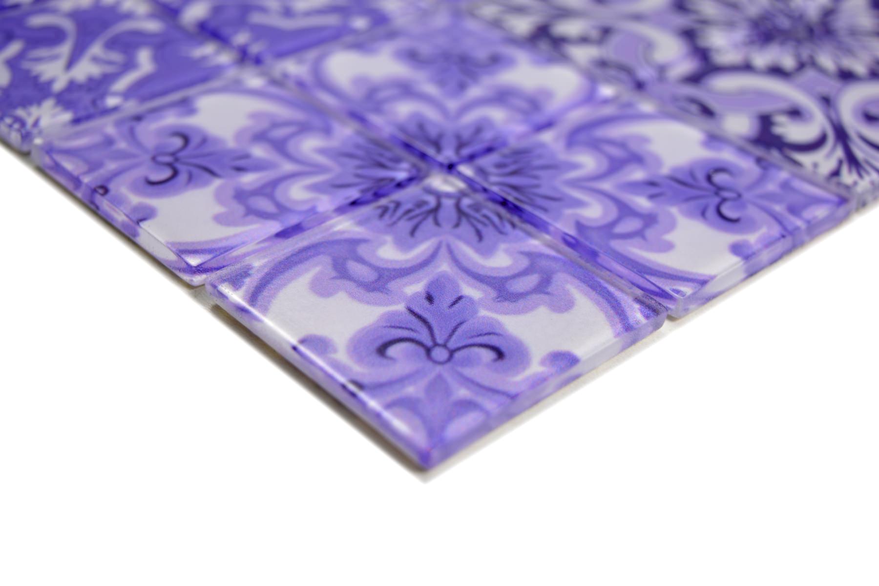 Close-up of Violetta Purple Ornate Pattern Glass Mosaic Tile showing glossy purple and white glass squares with a vintage floral design.