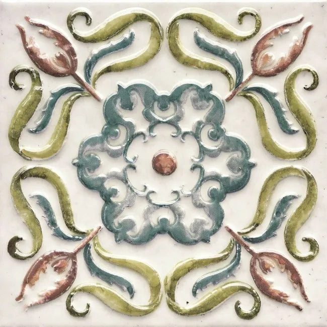 Close-up of patterned ceramic wall tile featuring medieval-inspired floral motifs and high-shine glazed surface.