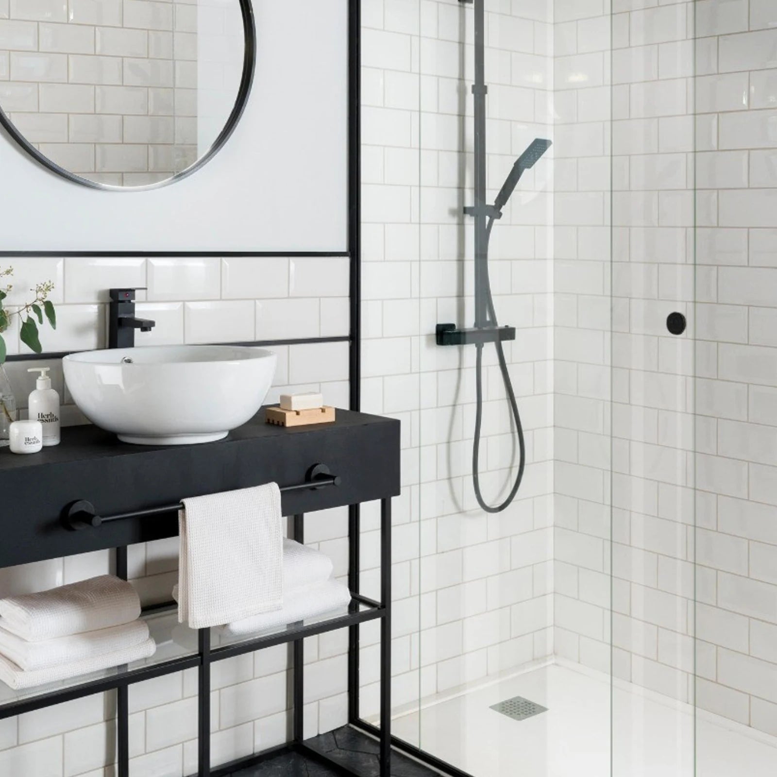 Classico Blanco White Metro 100x200mm gloss bevelled ceramic wall tiles in modern bathroom with black shower fittings