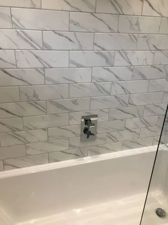 Metro Carrara Marble Effect Gloss Wall 300 x 100mm tile - Luxury Tiles UK