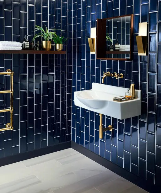 blue metro wall tiles in bathroom